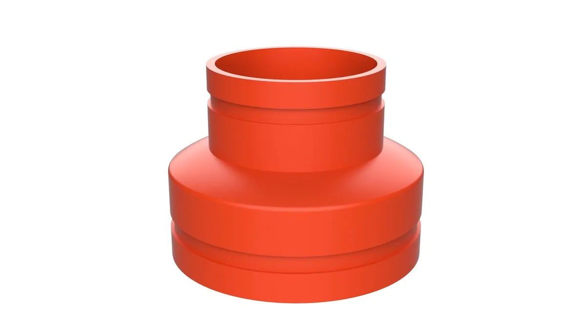 Reducción concéntrica ranurada de hierro fundido pintada de naranja (imagen referencial)